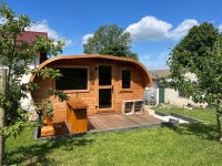 Premium Ovalsauna aus 45mm Thermofichte mit Runddach - Aus Ausstellung (incl. Ofen)